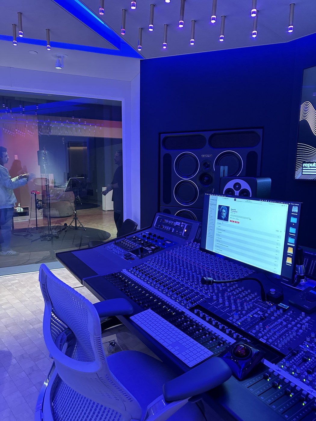 Inside a music recording studio with mixing console